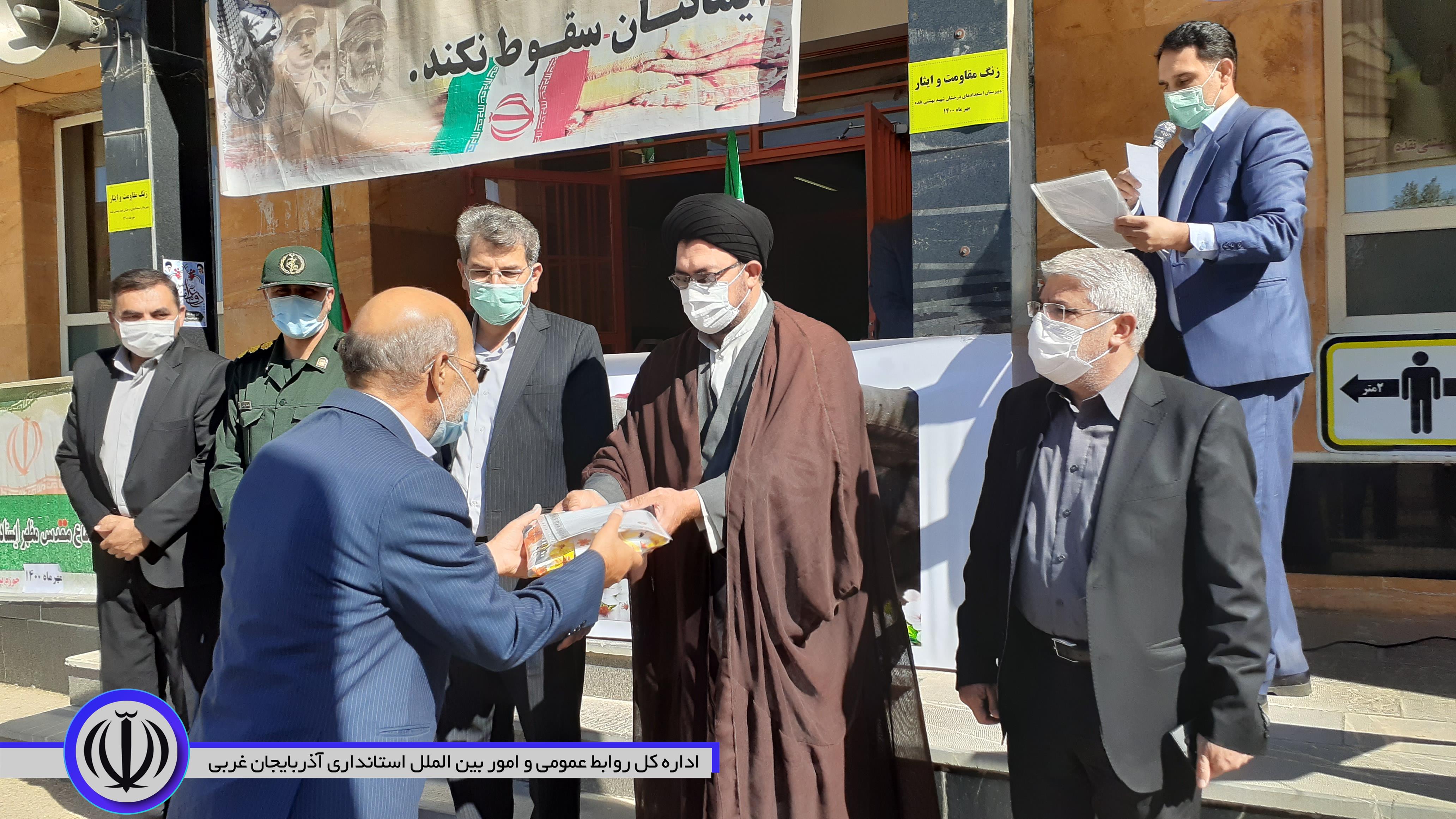 نواختن زنگ مقاومت و ایثار با حضور منوچهر شاکر فرماندار شهرستان نقده